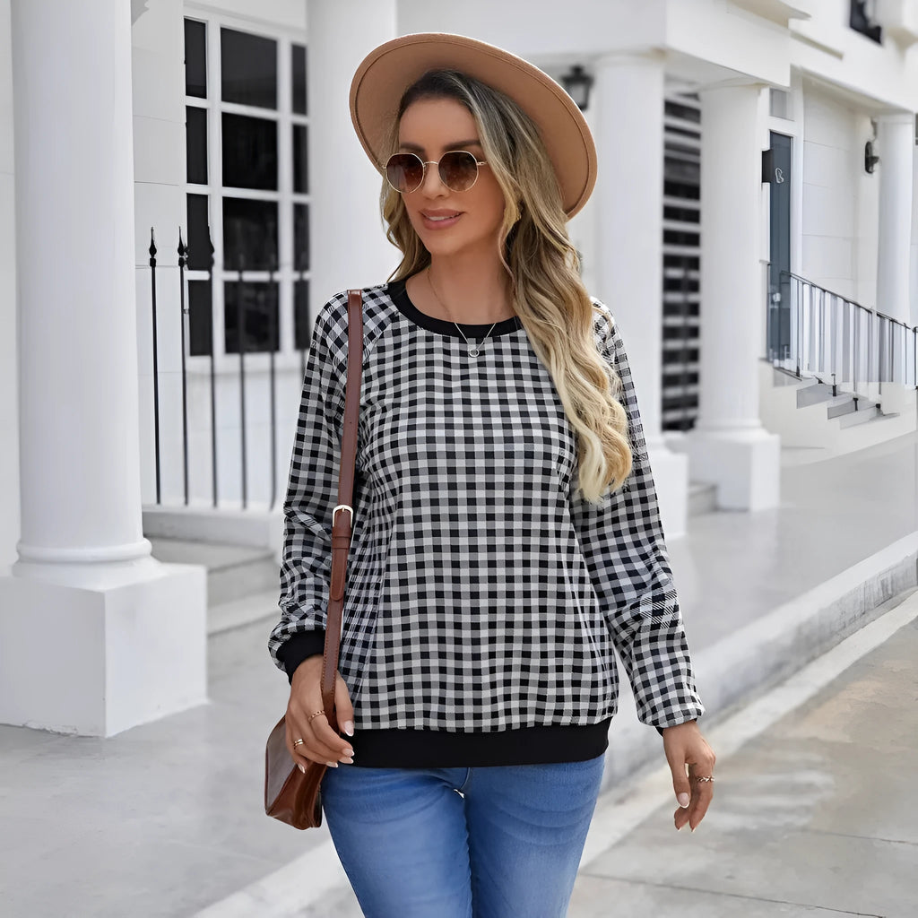Black Japanese plaid pattern long sleeve polyester sweater showing front view with regular sleeves