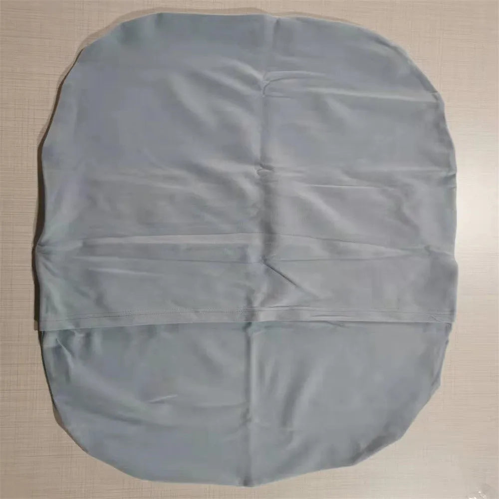 Beige portable baby nest crib for newborns measuring 75cm by 45cm on a neutral background.