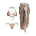 Women's floral bikini swimsuit set with skirt in creamy-white colour, showing top, briefs, and cover-up components