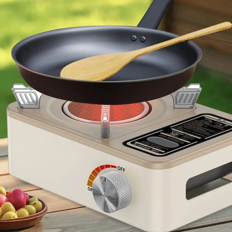 White portable gas stove with stainless steel construction for outdoor cooking