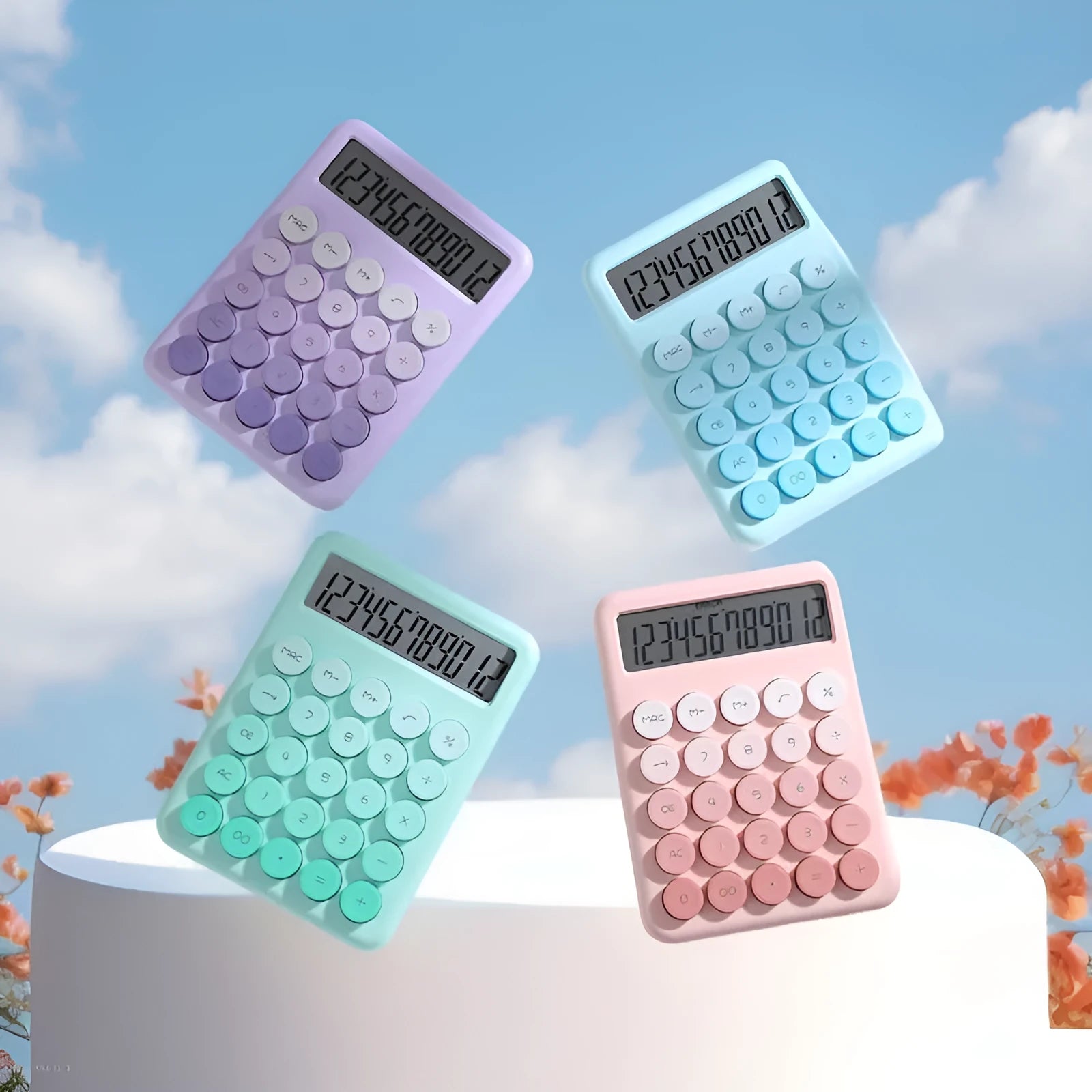 Gradient colour desk calculator showing violet, pink, blue, and green shades on an ABS plastic casing.