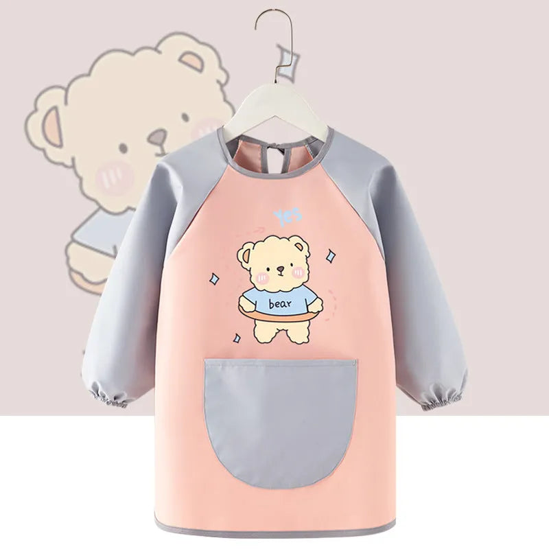 Children's waterproof painting apron with cartoon design in pink rabbit pattern, polyester fabric, inside-out style
