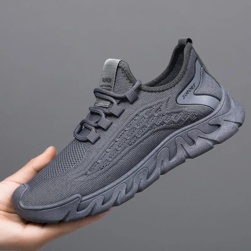 Breathable thin mesh flyknit casual men's sneakers in beige, low top with rubber sole and front lace-up