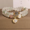 Tianshan emerald green crystal bracelet with gold-plated ginkgo leaf pendant and rhinestone details