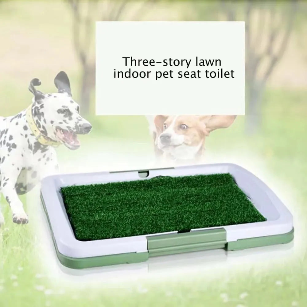 Green synthetic turf dog toilet tray with a plastic base for indoor puppy potty training.