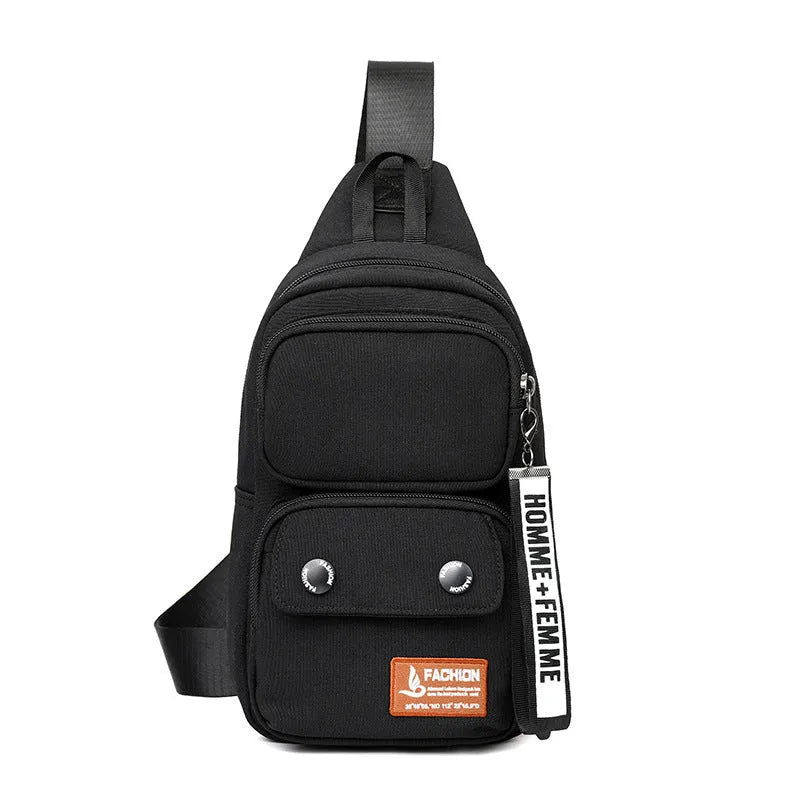 Black nylon crossbody bag with contrast colour accents and a polyester lining.