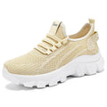 Women's white Flyknit sneakers with round toe and flat heel on a thick PVC sole.