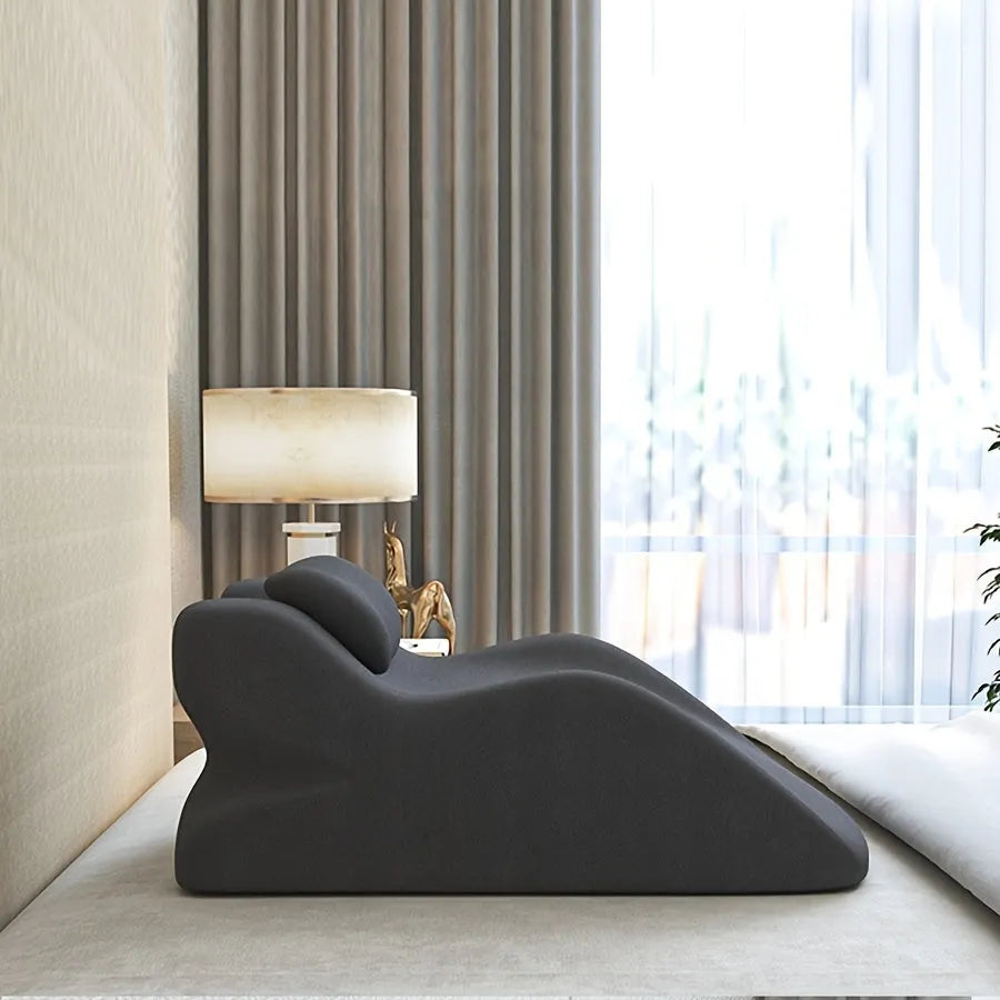 Stomach sleeper pillow for prone positioning shown in blue, dark grey, green, and light grey colour options.