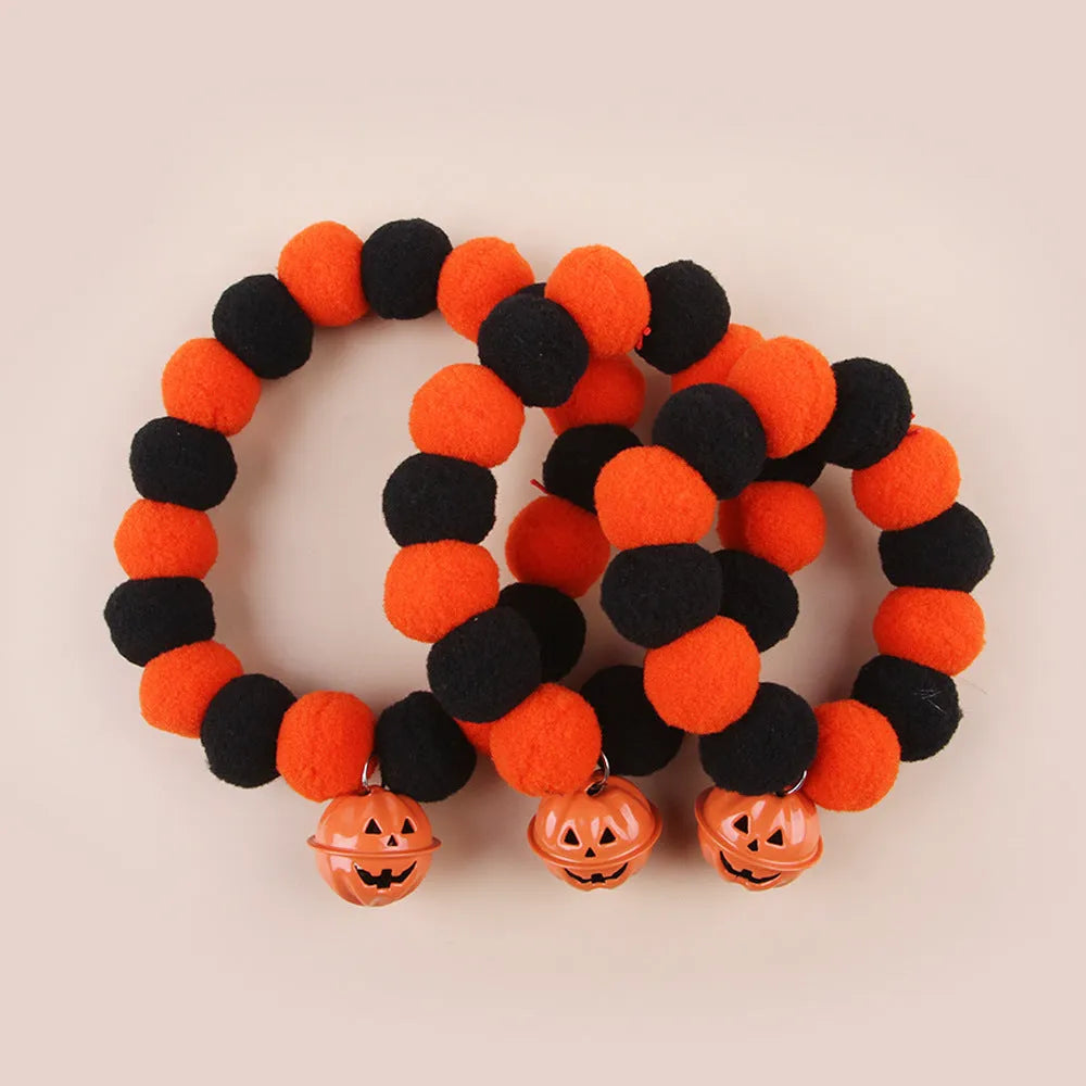 Halloween cat collar with pumpkin trick-or-treat design in three sizes
