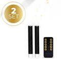 Black LED taper candle with glowing 3D flame effect on a dark background.