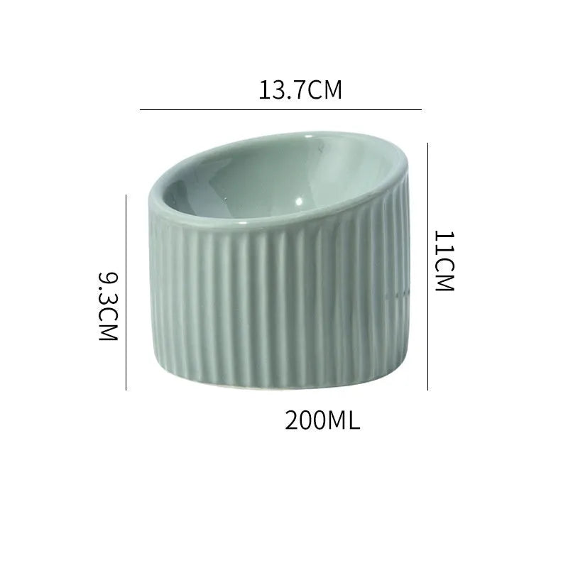 Ceramic elevated cat bowl in green colour with tilted design for anti-vomit feeding