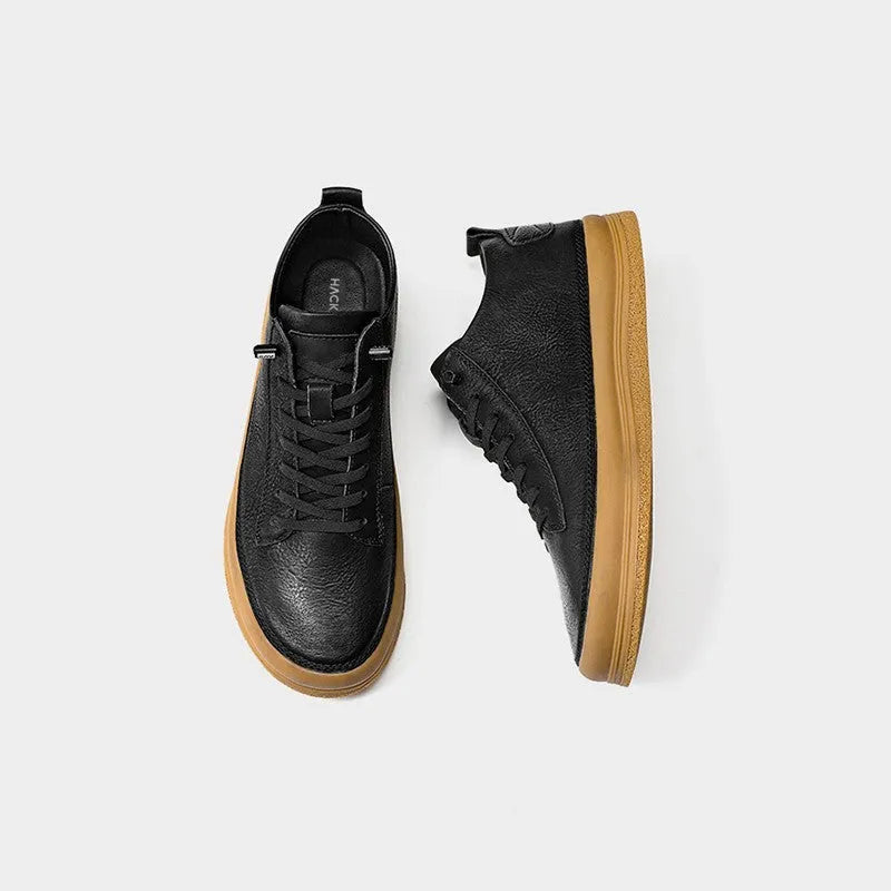 Men's black and white cowhide leather casual shoes with rubber soles and lace-up closure