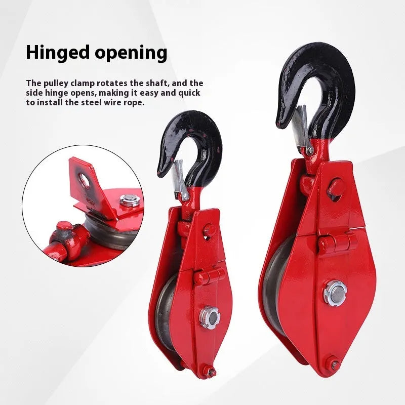 Red industrial steel lifting pulley with a safety latch on the hook.