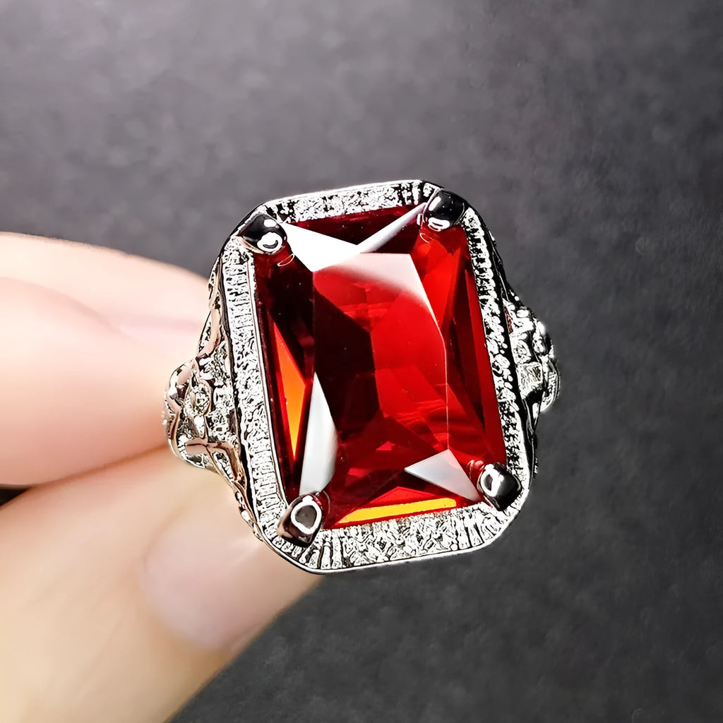Women's adjustable geometric ring with electroplated copper construction and ruby styling