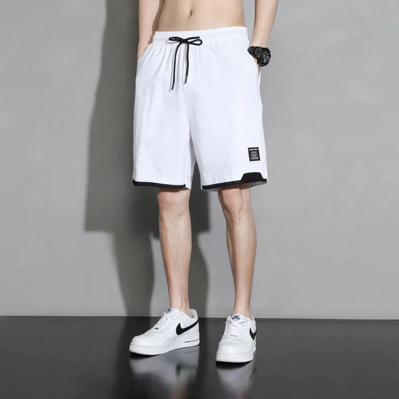 Boys cotton shorts in black, khaki, or white, shown in a loose-fitting Japanese style for summer.