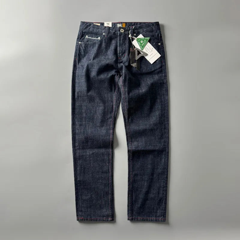 Men's straight leg cotton denim jeans in a primary colour, shown on a mid-waist fit model.