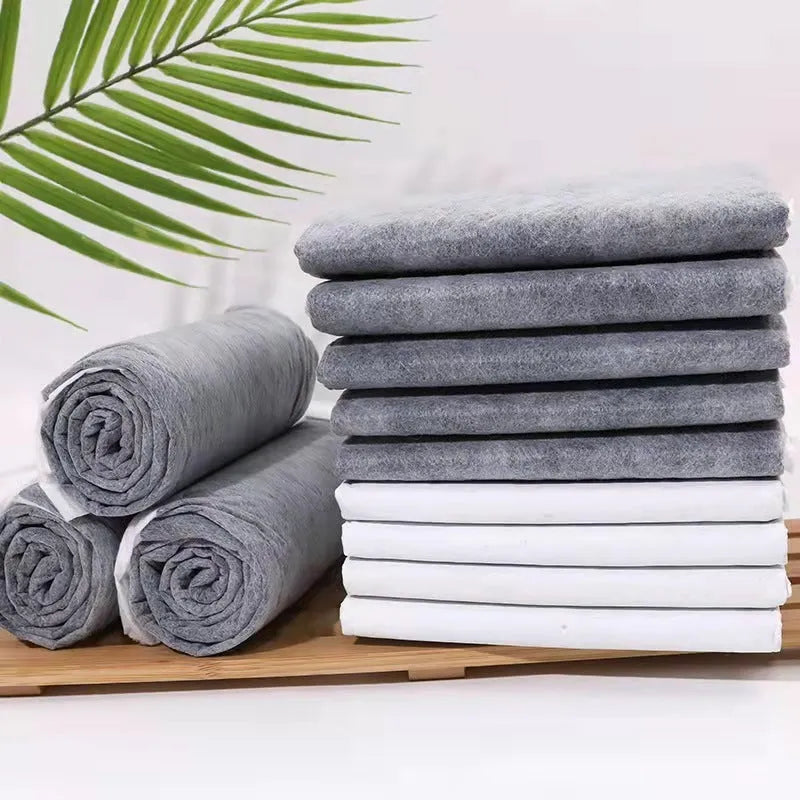 Pack of pet urinal pads showing different sizes and models including bamboo charcoal variant