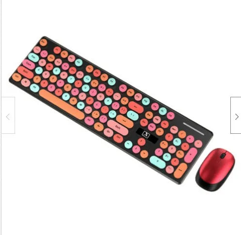 Vibrant yellow wireless punk manipulator design keyboard and mouse set on a desk.