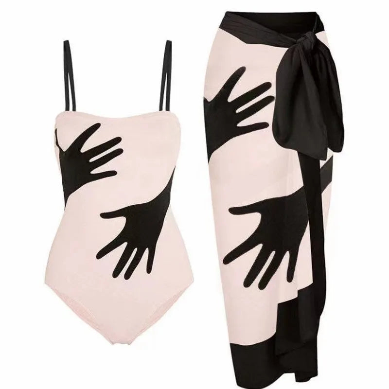Women's patterned polyester swimsuit with attached tulle skirt in one-piece bikini design