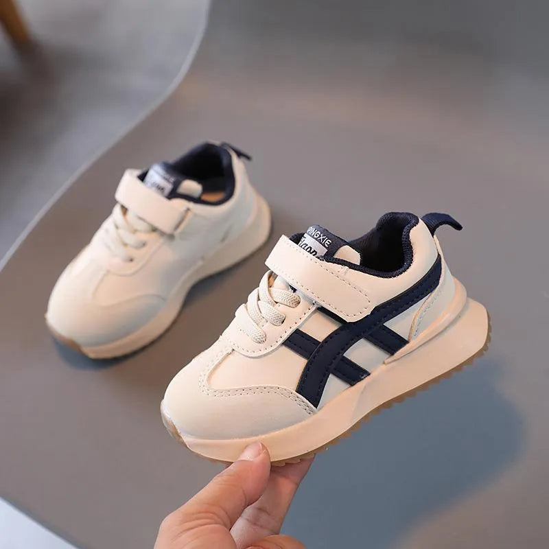 Children's white synthetic leather sneakers with Velcro strap and rubber sole