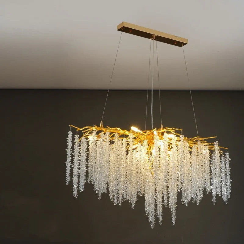 Modern crystal LED chandelier with adjustable height in a light luxury style.