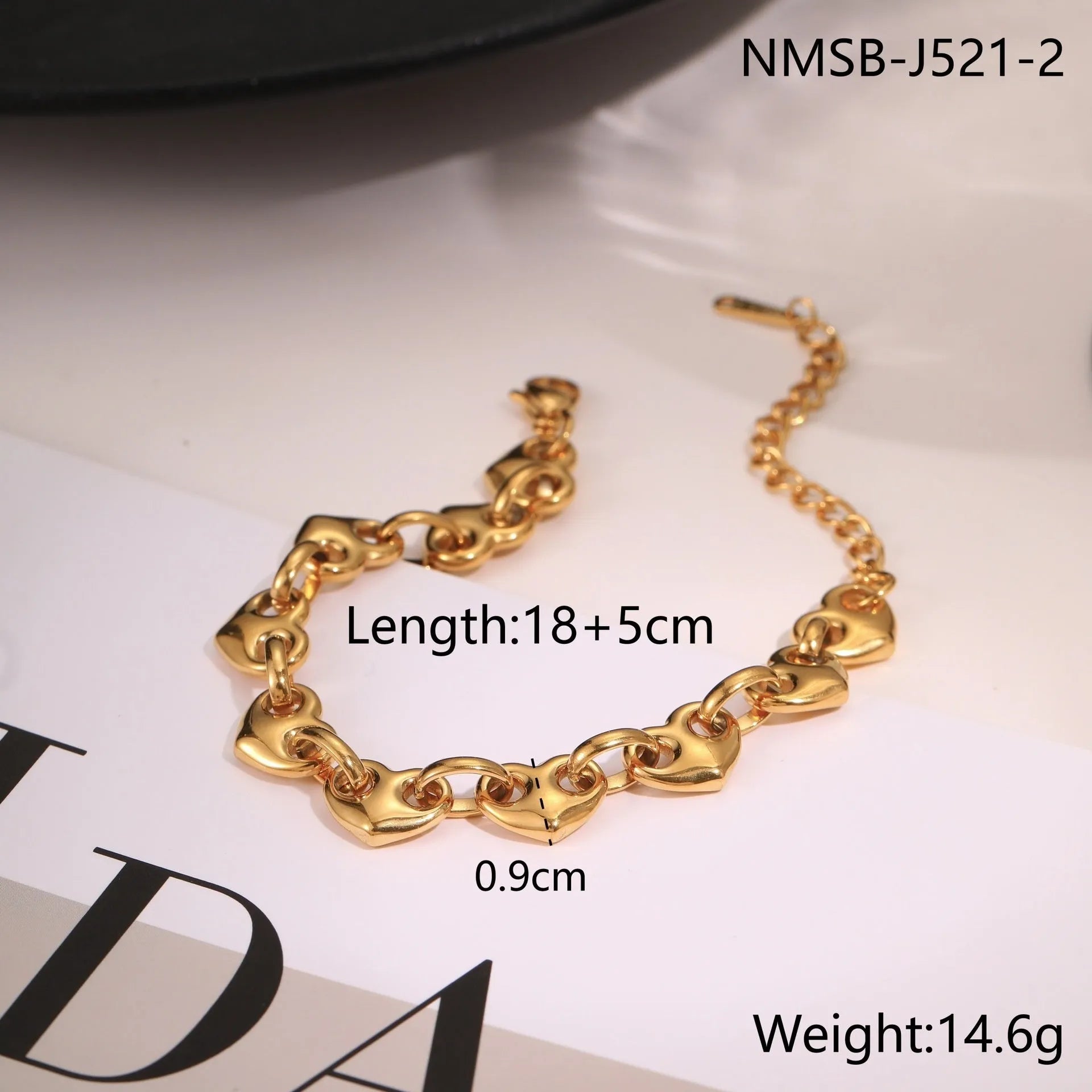 Hollowed-out geometric heart bracelet in stainless steel with gold electroplated finish