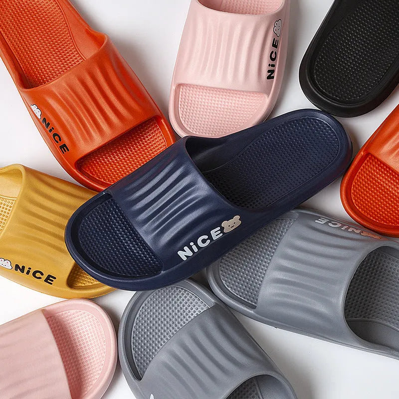 Minimalist cartoon pattern EVA flip flop slippers for household wear, shown in multiple colours.