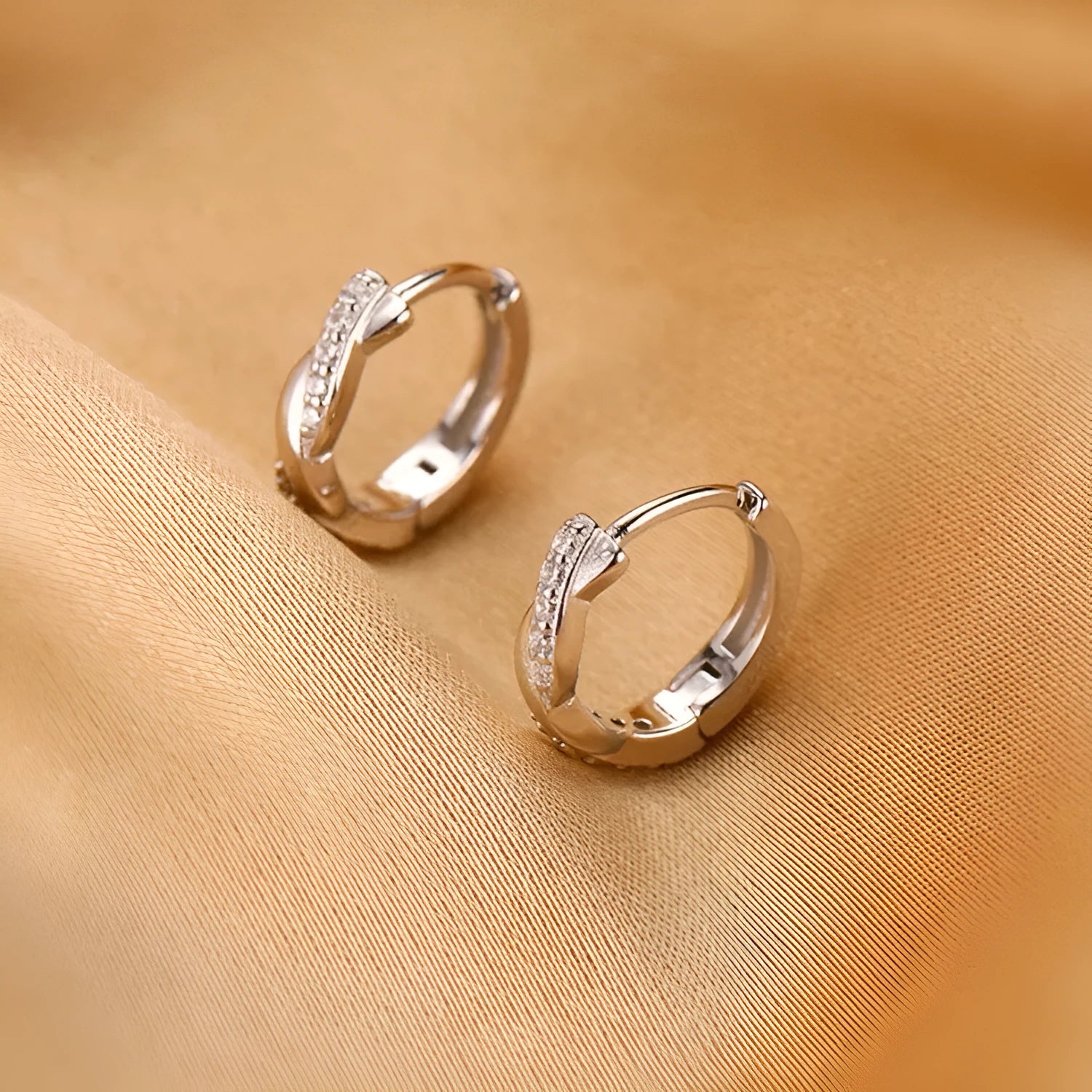 Geometric interwoven hemp rope earclip earrings for women in gold and silver colour options.