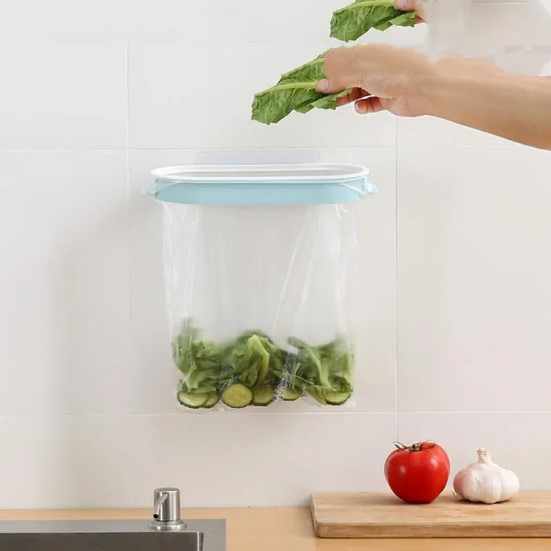 Plastic kitchen garbage bag storage rack in blue or pink for cabinet mounting