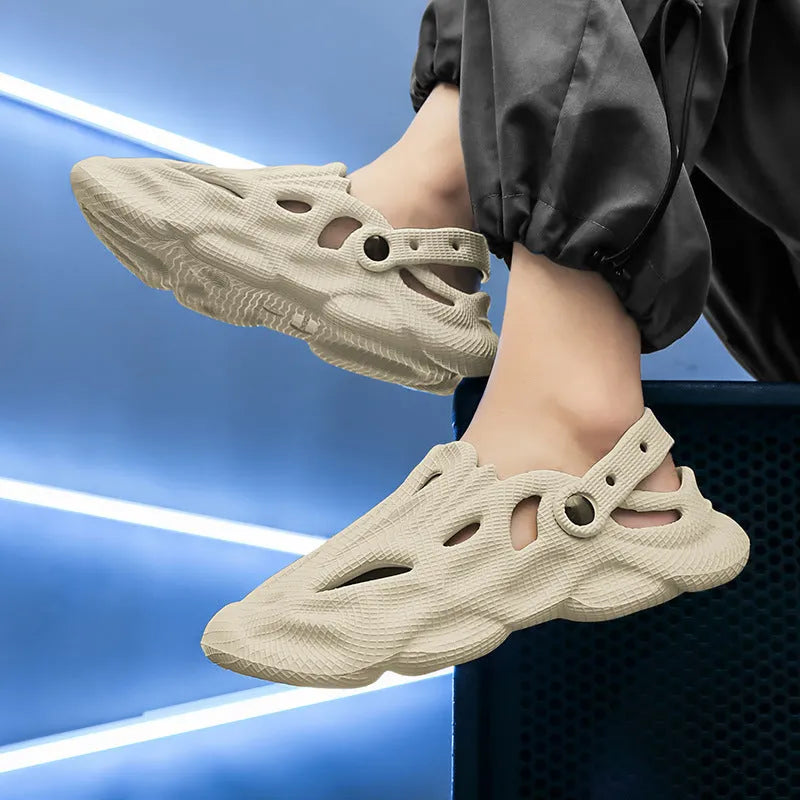 EVA soft men's summer beach shoes in grey colour on sandy surface