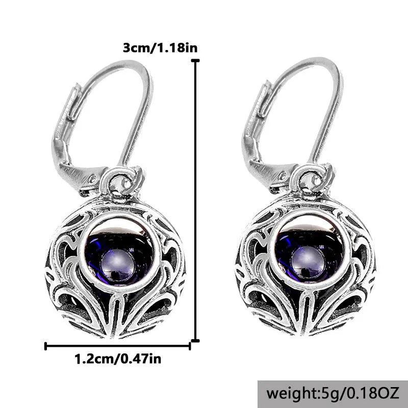 Silver geometric pendant earrings with vintage engraving and blue gemstone accents
