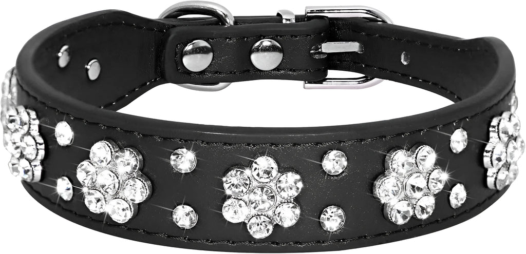 Decorative dog collar made of black PU leather with a pattern of rhinestone flowers and studs, showing the metal D-ring.