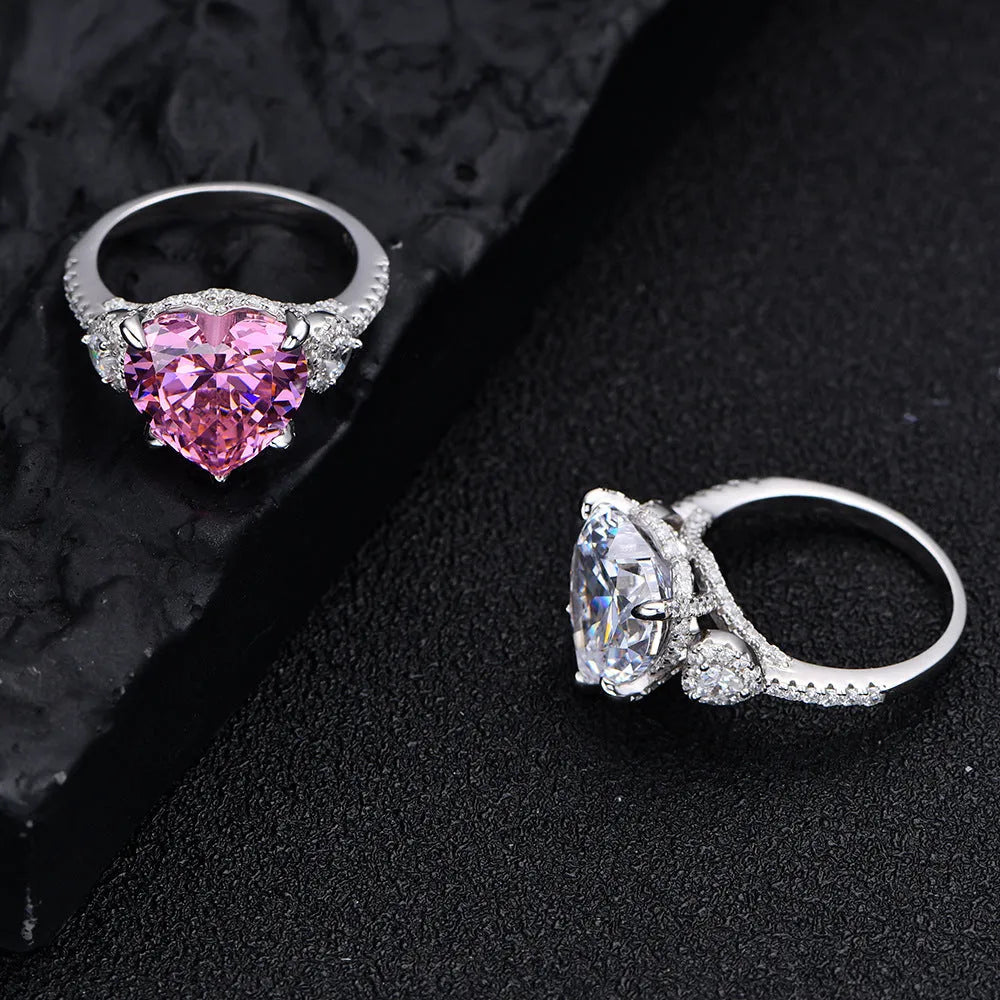 Heart-shaped diamond ring on white background, 925 silver band, open inlay setting