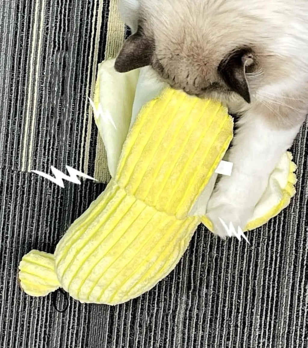 Yellow banana-shaped cat toy with crinkle paper sound feature measuring 13 inches long