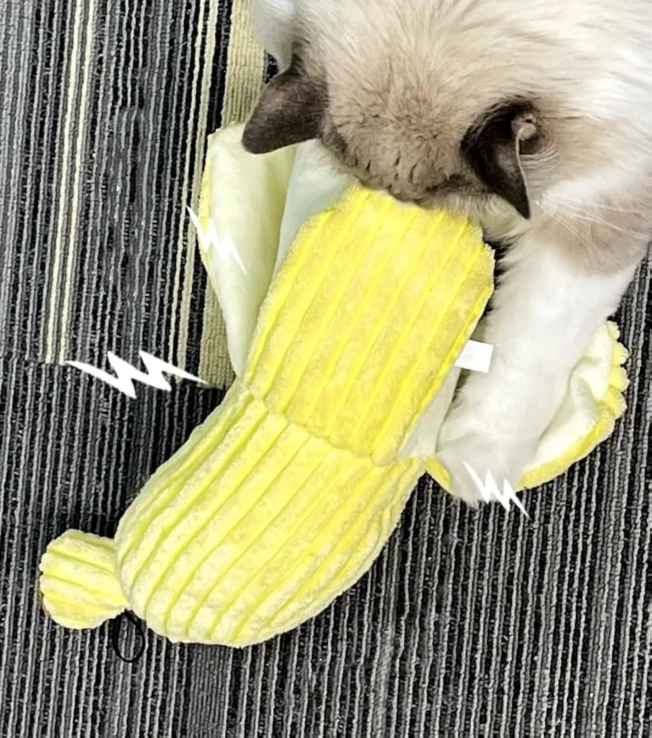 Yellow banana-shaped cat toy with crinkle paper sound feature measuring 13 inches long