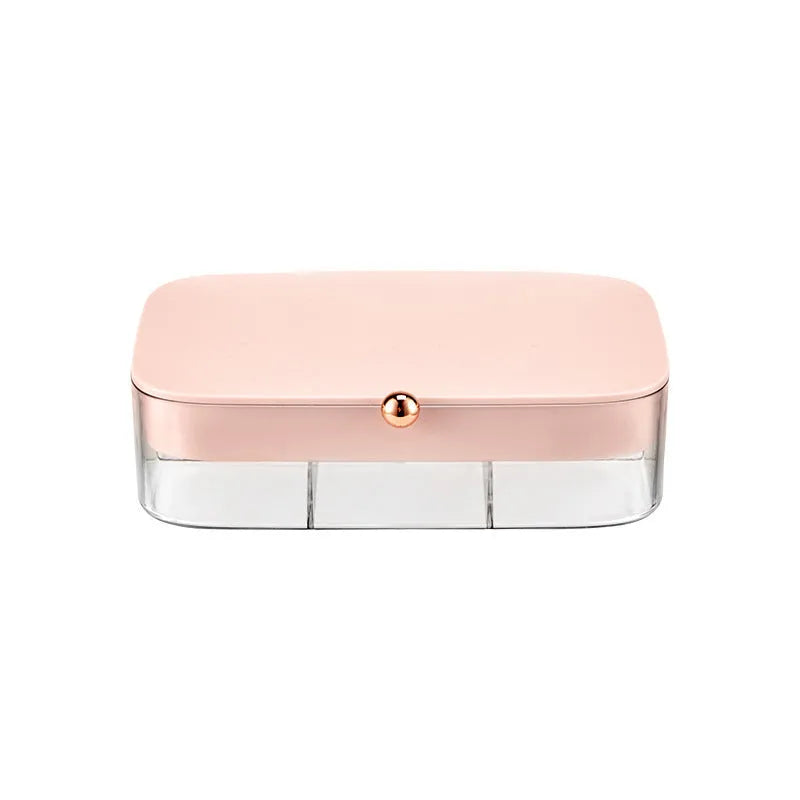 Green minimalist jewellery storage box with multiple internal compartments for rings and earrings.