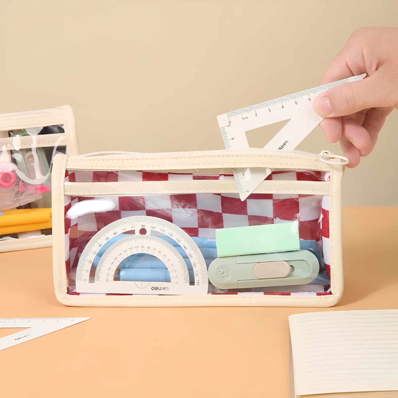 Transparent PVC pencil case with chessboard pattern measuring 21.5cm