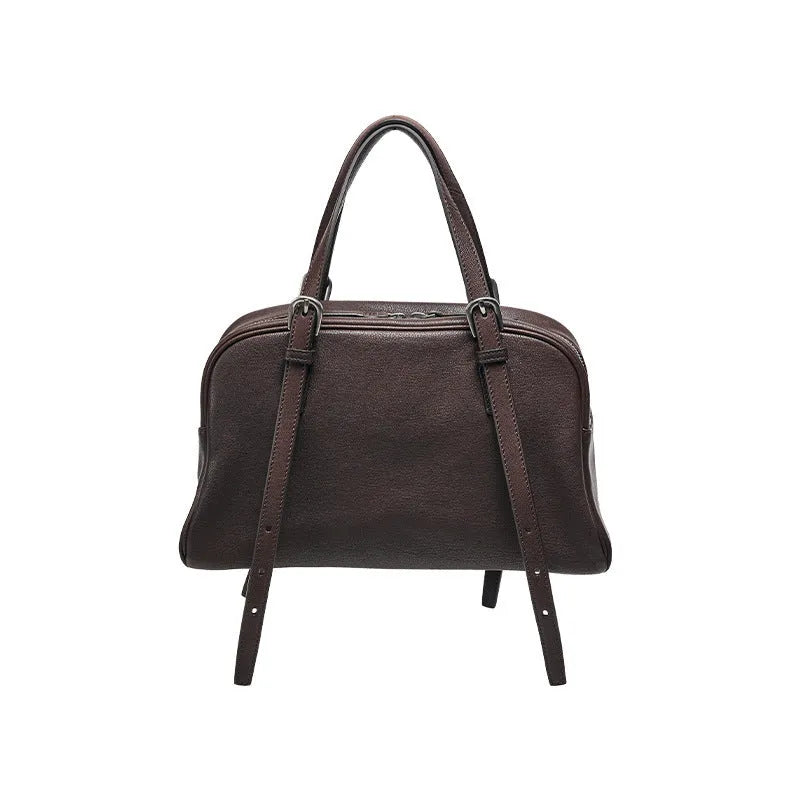 Women's genuine leather retro shoulder bag in horizontal square shape with double straps.
