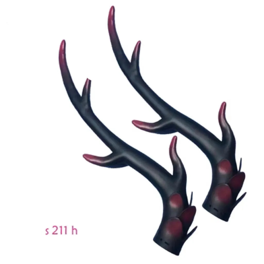 A pair of detailed black resin dragon horn decorations for customising motorcycle and scooter helmets.