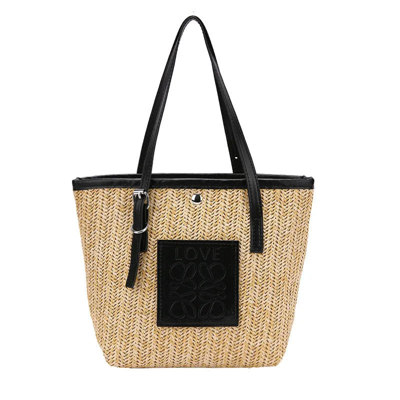 Women's woven straw shoulder bag in retro style with three-dimensional pocket and visible sewing thread details