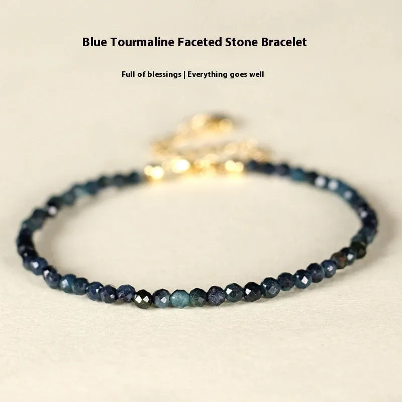 Women's blue tourmaline bracelet with 3mm beads and spacer design