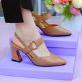 Women's apricot leather closed-toe backless sandals with a chunky heel on a neutral background.