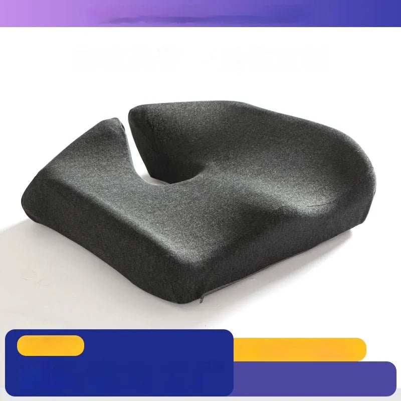 Black memory foam office chair cushion with a solid colour polyester cover, shown on a chair seat.