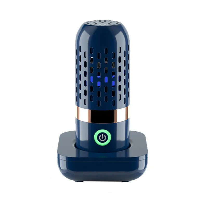 Blue capsule fruit and vegetable purifier with mechanical button and USB charging, placed in water
