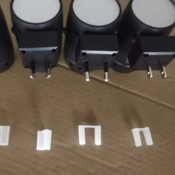 Plug-in adjustable LED night light with rotatable head in warm white 300K colour
