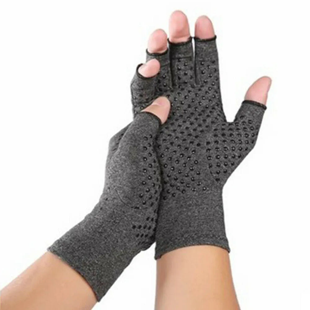Grey half-finger joint compression gloves with anti-slip grip on a hand.