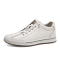 Men's white round toe matte leather casual shoes with flat heel on a plain background.