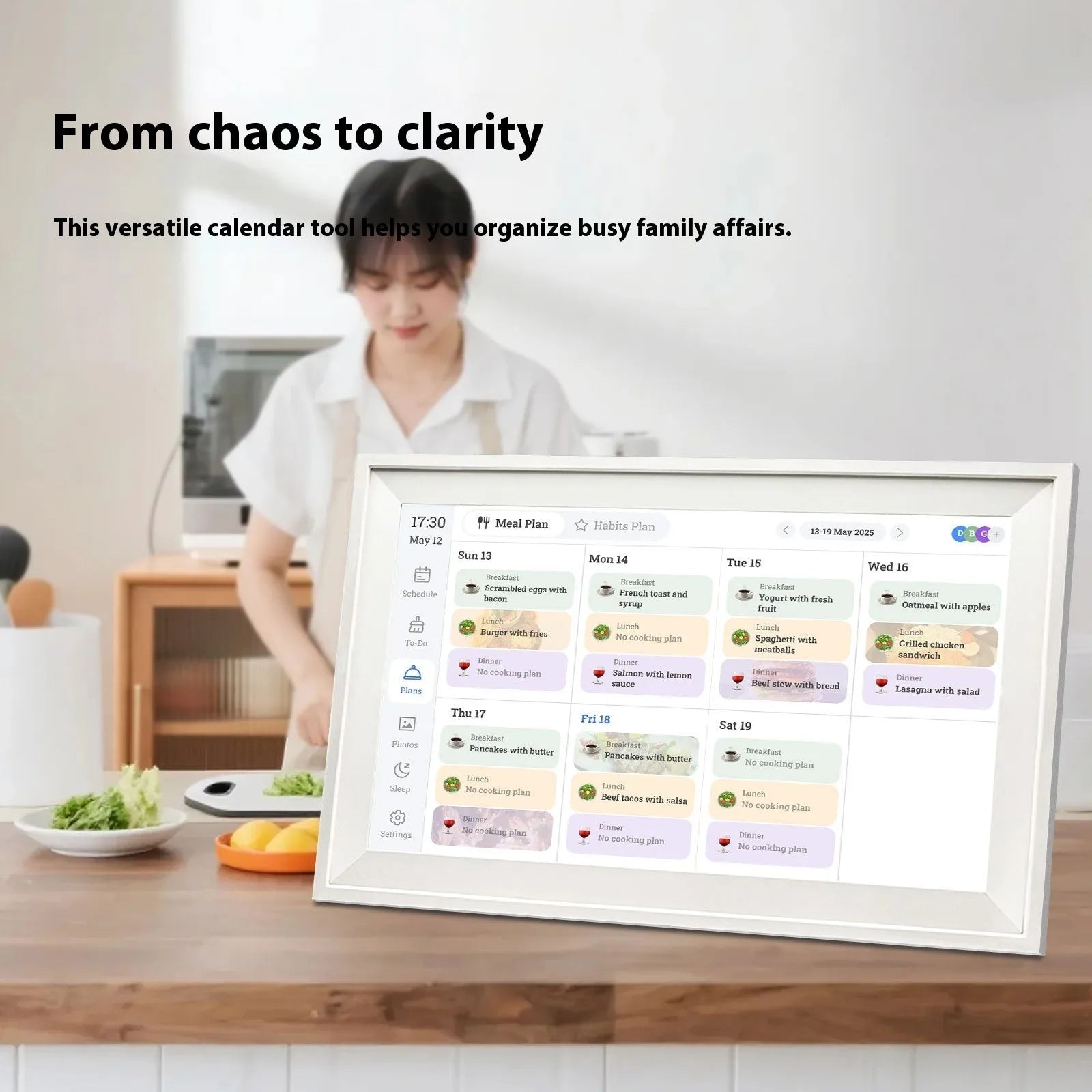 White 15.6 inch smart digital photo frame with app connectivity on tabletop