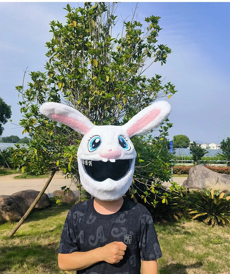 White plush rabbit head decorative cover on a motorcycle helmet for electric scooter commuting