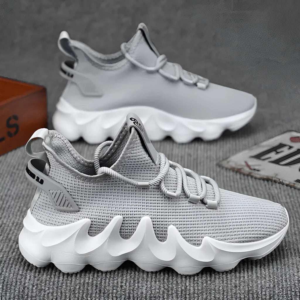 Men's black sock-like low-top lace-up shoes with round toe and flat rubber sole on white background
